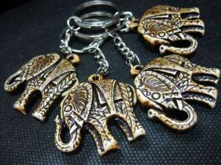 4pcs tibet elephants totem lucky amulet yak bone powder lovely key 