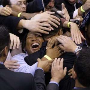 Barack Obama, Covered in Hands after His Primary Election Night Speech 