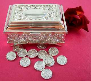This elegant footed box features a beautiful floral and leaf/vine 