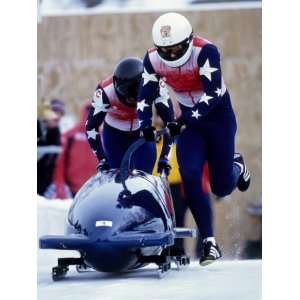 Man Bobsled Team Pushing Off at the Start, Lake placid, New York, USA 