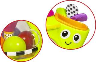 Ball spinner and four plastic balls.