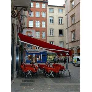 Cafe on Cobblestone Street, Rhone Alps, Lyon, France Photographic 