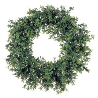 This artificial boxwood wreath makes a great addition to any decor.