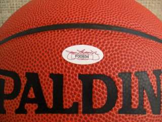 Signature is hand signed on a replica NBA Spalding basketball. The 