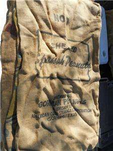 THIS IS A LARGE BURLAP PEANUT SACK. ABOUT 42 INCHES WIDE AND ROUGGLY 