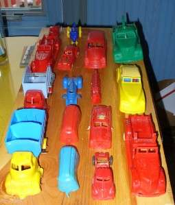   lot of old toy plastic cars and trucks sold as is for parts  