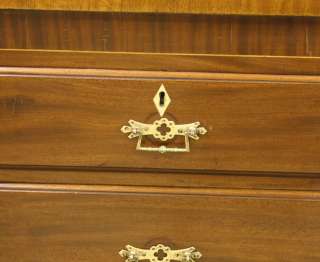 These solid brass pulls contrast beautifully with the mahogany.