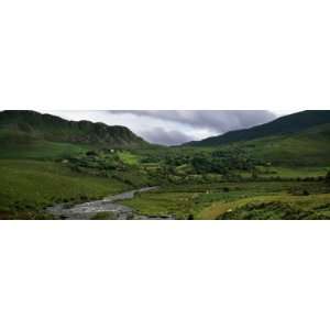 com Stream Through Lush Mountain Landscape, Distant Cottages, Ireland 