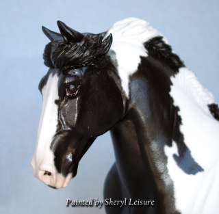   to make it a Gypsy Vanner. Then I painted it black pinto, of course