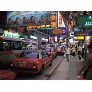 Hectic Street with Cars and People in Busy Hong Kong, China Stretched 