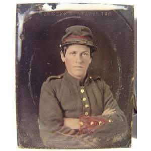   soldier in Confederate artillery uniform,forage cap