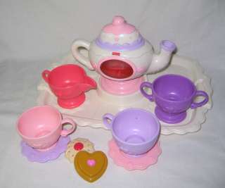 set of plastic Mattel tea set Fisher Price teapot cups bowl plates 