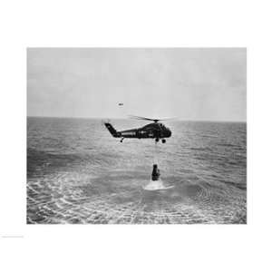  Marine helicopter lifting the astronaut spacecraft out of 