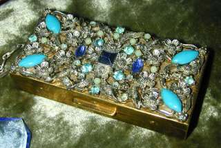 plus a brooch that has speckled egg art glass stones