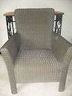 gray wicker chair by 