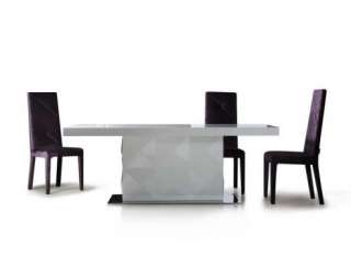   modern dining table has a sleek lines and is made from the finest