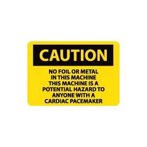 OSHA CAUTION No Foil Or Metal In This Machine Is A Potential Hazard 