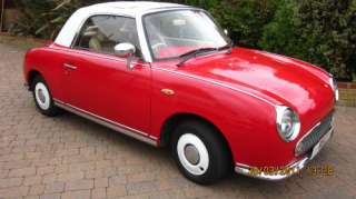 NISSAN FIGARO, RED WITH TURBO 1000CC ENGINE AUTOMATIC  