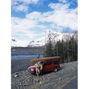  Couple with Canoe Checking Their Map at Exit Glacier, off 