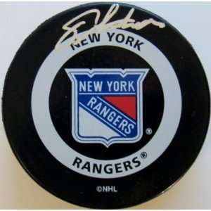 Autographed Eric Lindros Puck   Official STEINER   Autographed NHL 