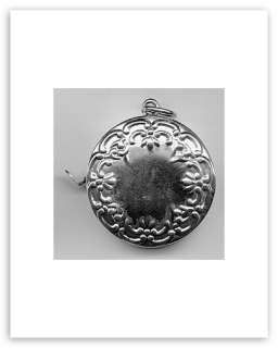 Repousse Tape Measure   Sterling Silver  
